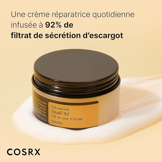 Image de 'Advanced Snail 92 All In One Cream' de COSRX, présentée dans un pot rond transparent avec un couvercle noir, posé sur un fond neutre. Cette crème tout-en-un contient 92% de mucine d'escargot, qui hydrate, répare et apaise la peau tout en améliorant sa résilience et sa texture. Parfaite pour les consommateurs au Maroc à la recherche de solutions de soin de la peau multifonctionnelles, disponible sur Beauty-Care.ma.