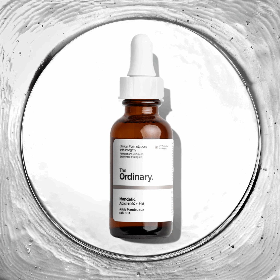 Image de 'Acide Mandélique 10% + HA - Soin peeling pour peaux sensibles' de The Ordinary, présenté dans un flacon compte-gouttes transparent avec des détails noirs, sur un fond clair. Ce soin peeling doux est formulé spécialement pour les peaux sensibles, utilisant l'acide mandélique pour exfolier délicatement sans irriter, tout en hydratant grâce à l'acide hyaluronique. Parfait pour les utilisateurs au Maroc cherchant un peeling efficace mais doux, disponible sur Beauty-Care.ma.